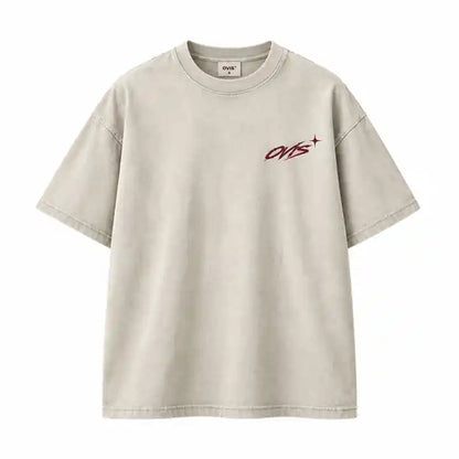 OVIS Cosmic Orbit Tee Vintage Stone — vista frontal con logo en el pecho